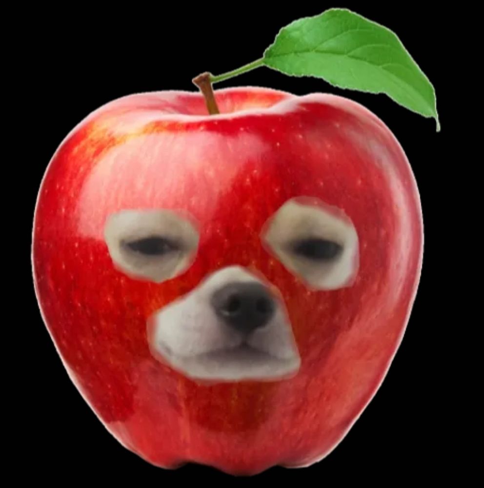 A picture of an apple with the face of a Chihuahua looking suspicious
