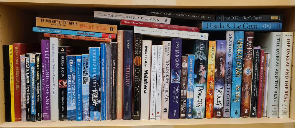 Bookshelf with most of the books Ursula K. Le Guin has produced.