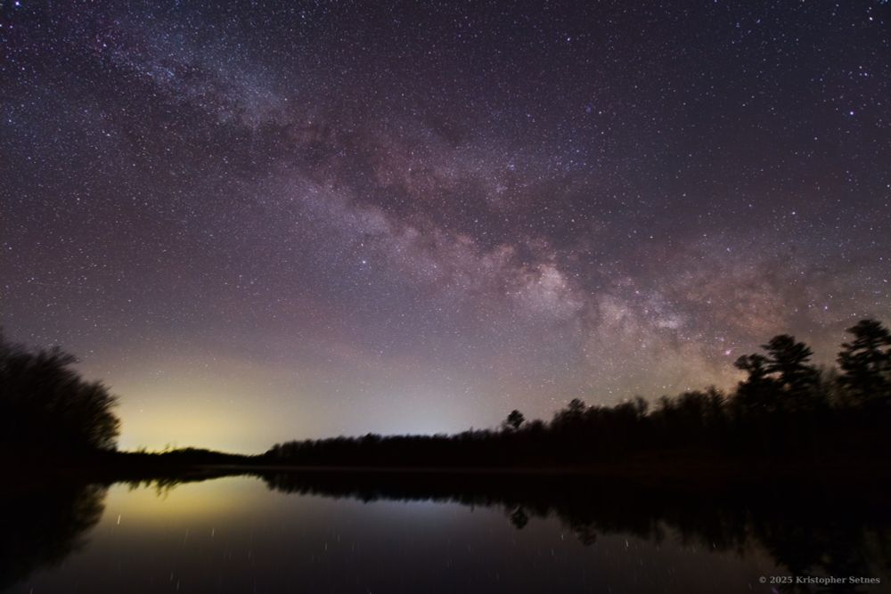 Milky Way rising over lake in Minnesota.