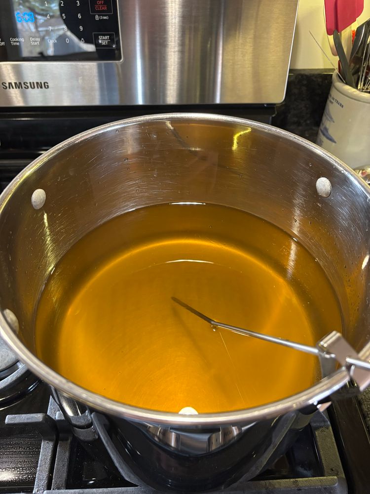 Maple syrup after some filtering, but before finishing to the correct density.
