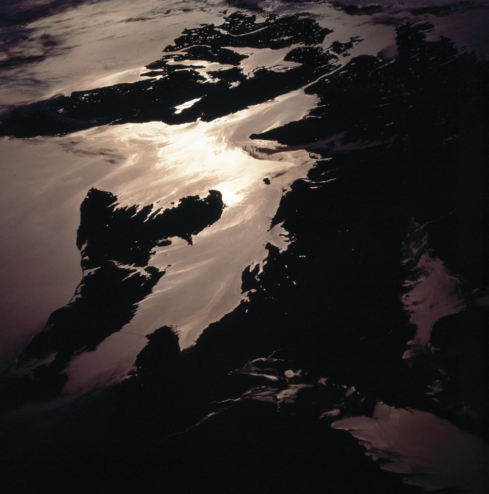 photo taken from STS showing parts of Canadian provinces PEI and NS at low sun angle.