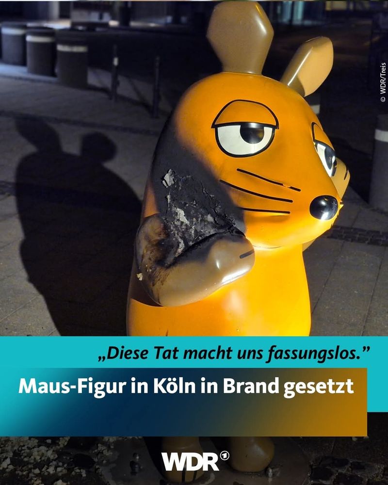 Beschädigte Maus Figur 