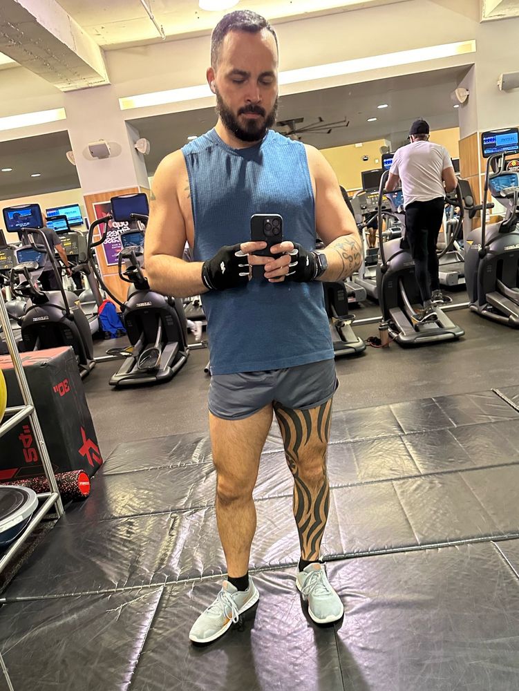 Mirror selfie in blue tank and grey Soffe silkies