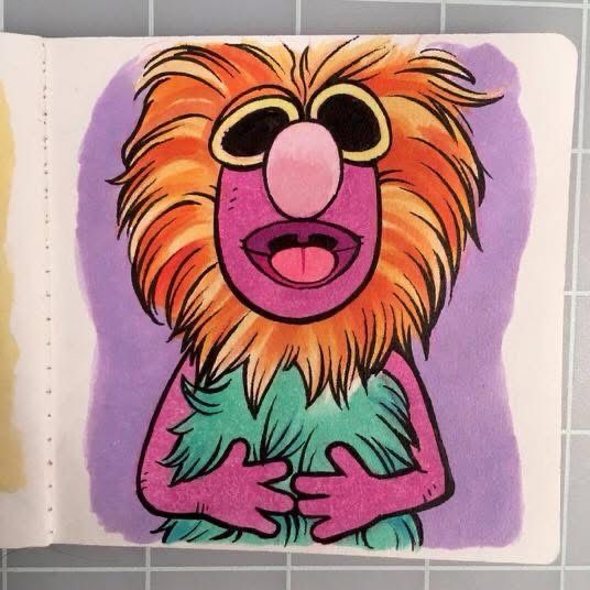 A small marker drawing of the he “Mahna Mahna” Muppet who has purple skin, a mane of orange hair, and a green fur torso or outfit.