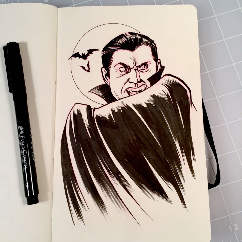 Pen and ink drawing of Bella Lugosi as Dracula in a small Moleskine sketchbook.  A Faber-Castell PITT artist pen sits on the page to the left of the drawing.
