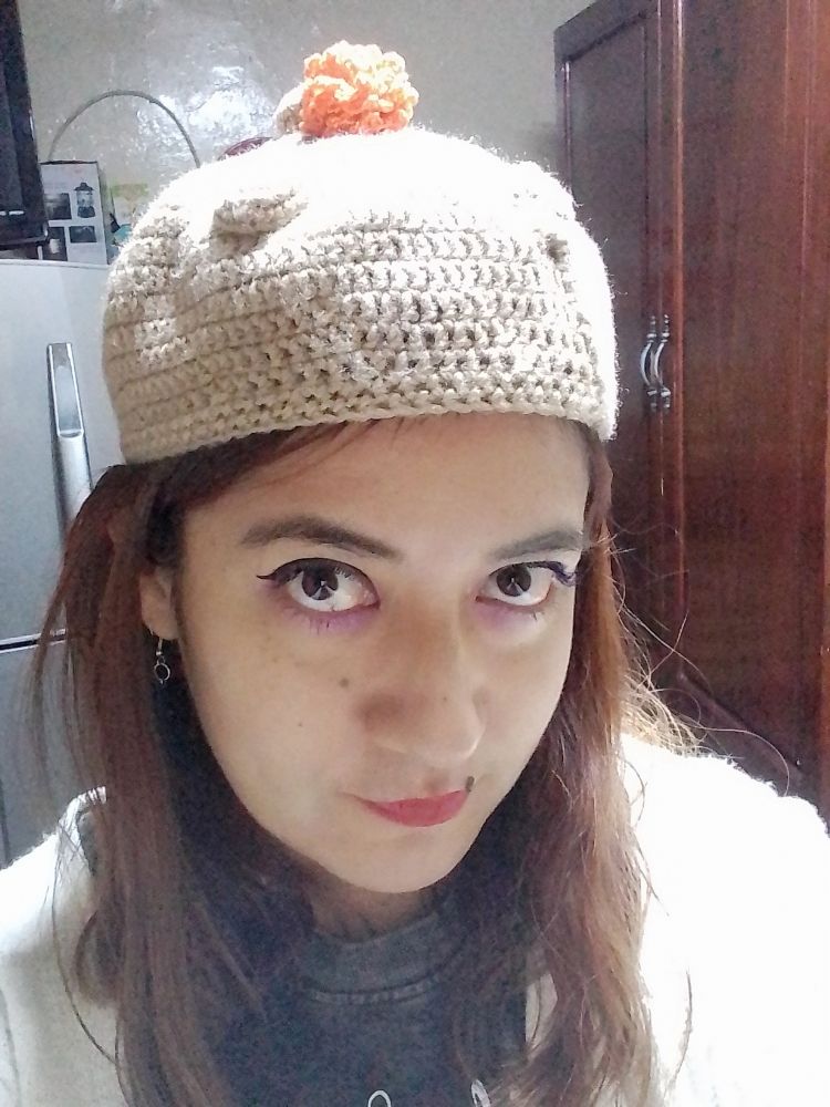 Selfie de persona con boina de pan de muerto 