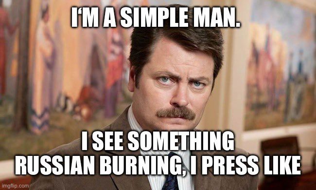 The Parks and Recreation character played by Nick Offerman with the caption “I’m a simple man. If I see something Russian burning, I press like.”