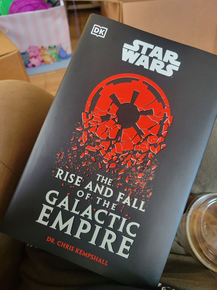 A book titled THE RISE AND FALL OF THE GALACTIC EMPIRE