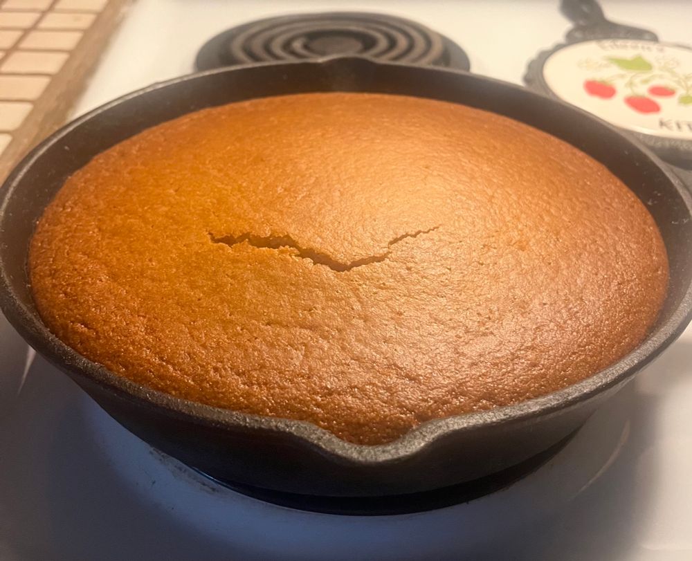 Cornbread freshly baked from scratch in a cast iron skillet-YUM