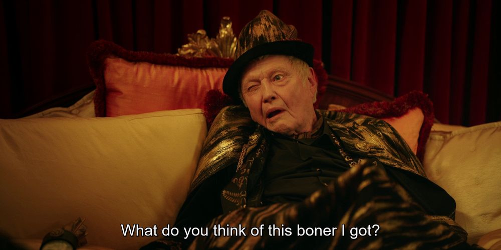 Jon Voight pretending to be a stroke victim and dressed up like Robin Hood in bed with a blanket over his lap and something big sticking up while he says "What do you think of this boner I got?"