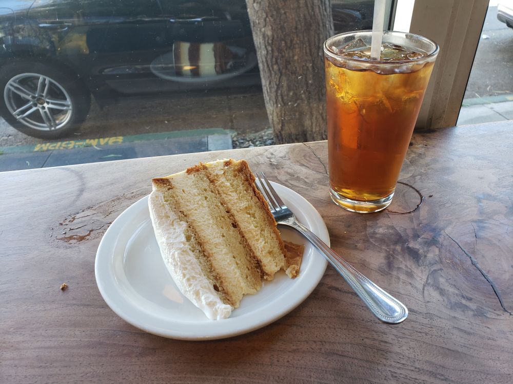 Tres leches cake and an iced tea