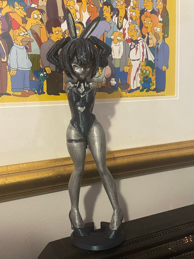 3d printed Rabbit Hole Miku with metalic sharpie used as an accent