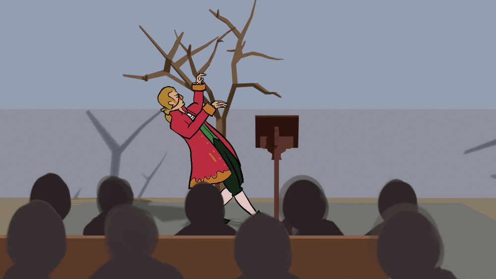 Ricky mid-fall as people in the audience look on