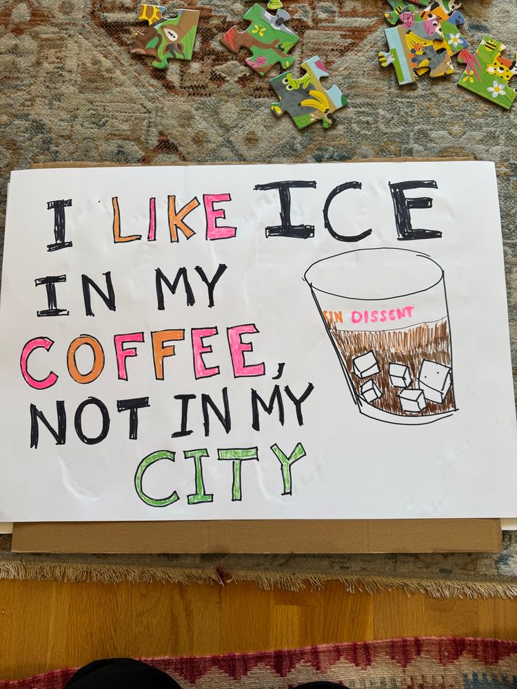Protest sign that reads “I like ice in my coffee, not in my city.” The lettering is both Dunkin’ donuts colors and green for Fenway park
There’s a crude drawing of an iced coffee with “dissent” written on it, dunkies style