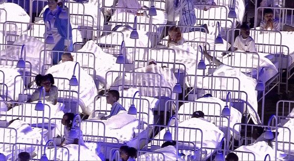 A shot from the 2012 London Olympic opening ceremony celebrating the UK’s National Health Service.