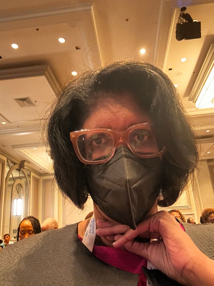 Masked at conference 