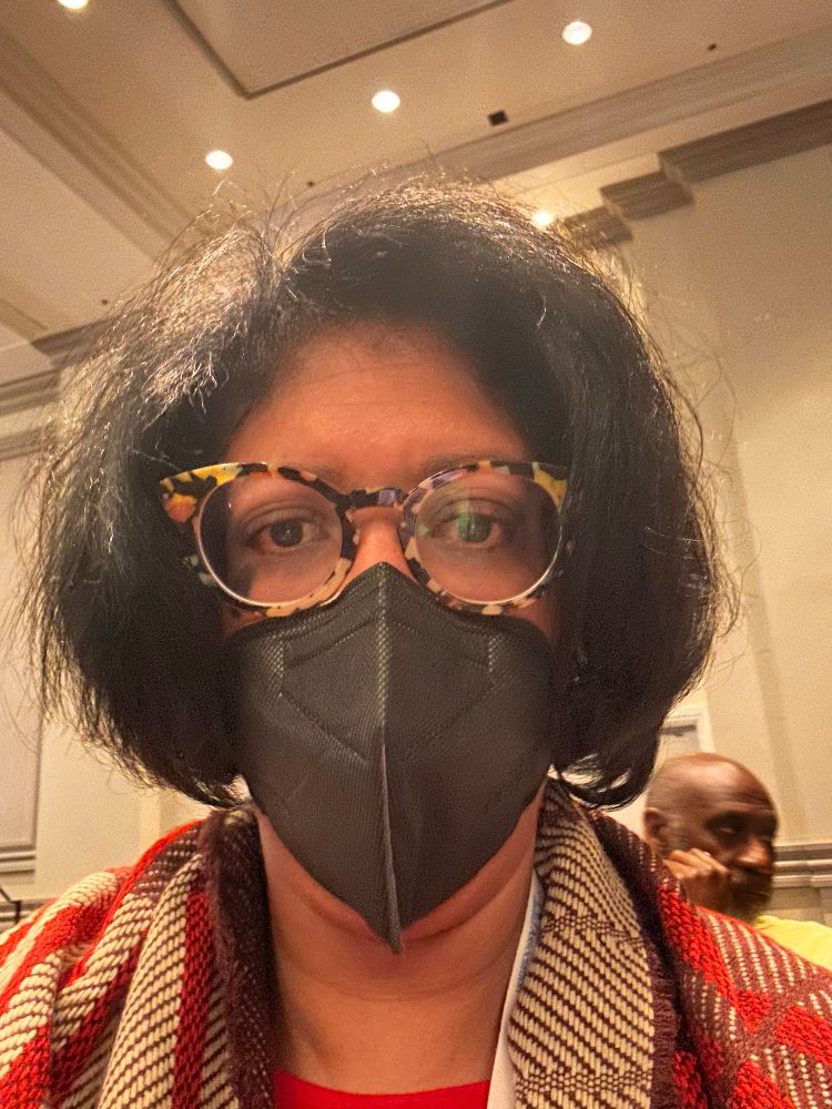 Masked at conference 