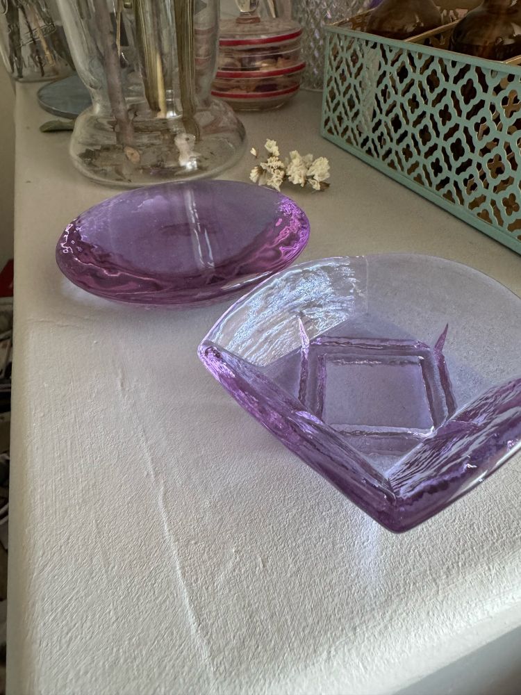 Lavender glass jewelry cache and candle holder.
