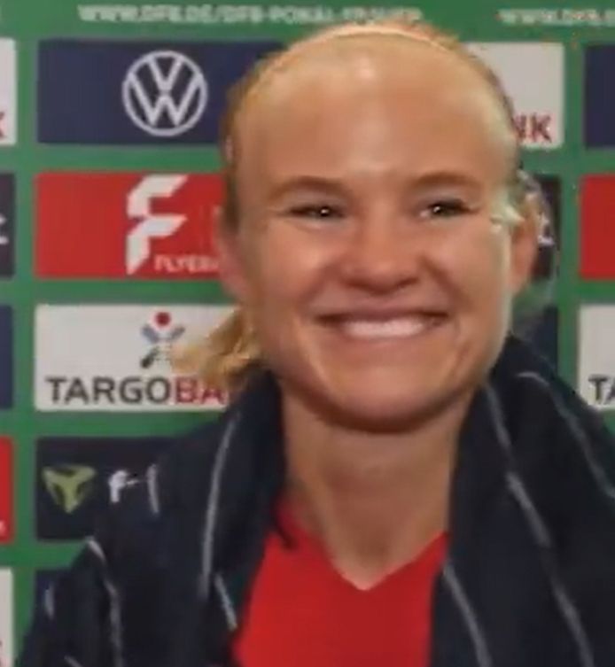 Pernille Harder smiling brightly. 