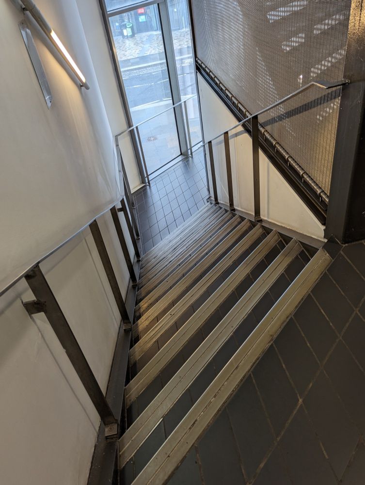 Stairs with a disconcerting angle that forces your left and right steps to be slightly different 