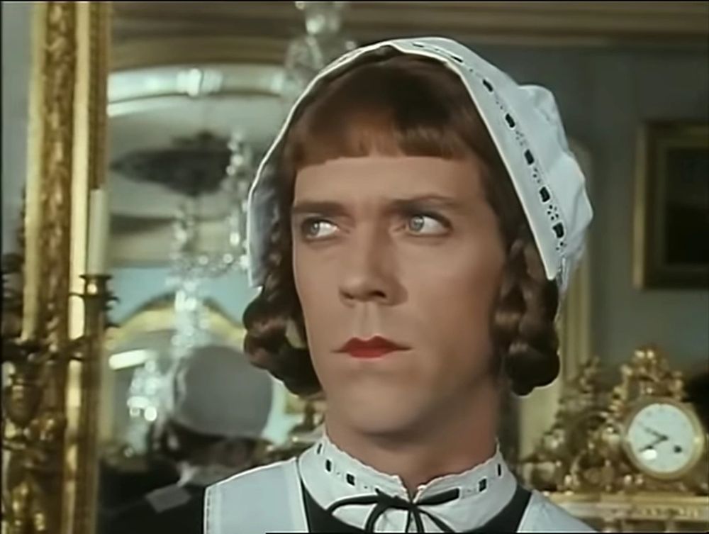 Wooster disguised as a female maid