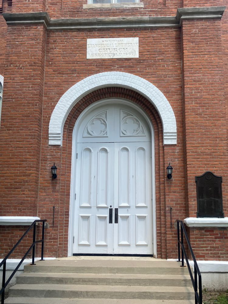 The front door of the Andover Lutheran Church. The stone reads “Swedish Evangelical Lutheran Church Erected A.D. 1867. 