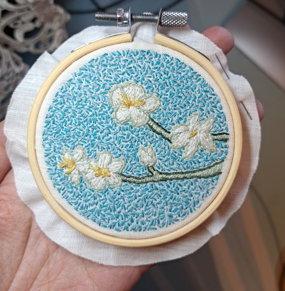 Embroided picture of a fragment of Vincent Van Gogh's Almond Blossom.