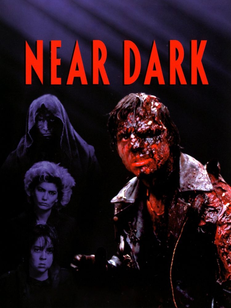 Near Dark poster showing a young man covered in blood and burns
