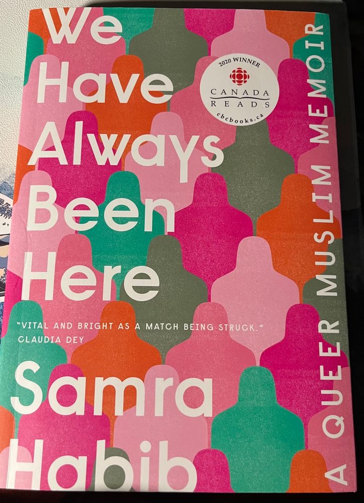 A multicoloured pink green and orange book cover “We have always been here” by Samra Habib, a Queer Muslim Memoir. 