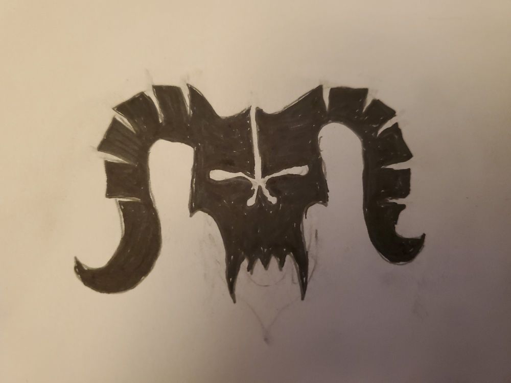 Rough ink on paper of a black and white icon shaped like a stylized skull with fangs and a pair of large, downward sweeping segmented horns. 