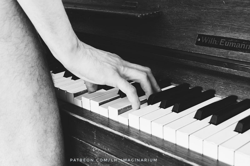 A hand playing piano