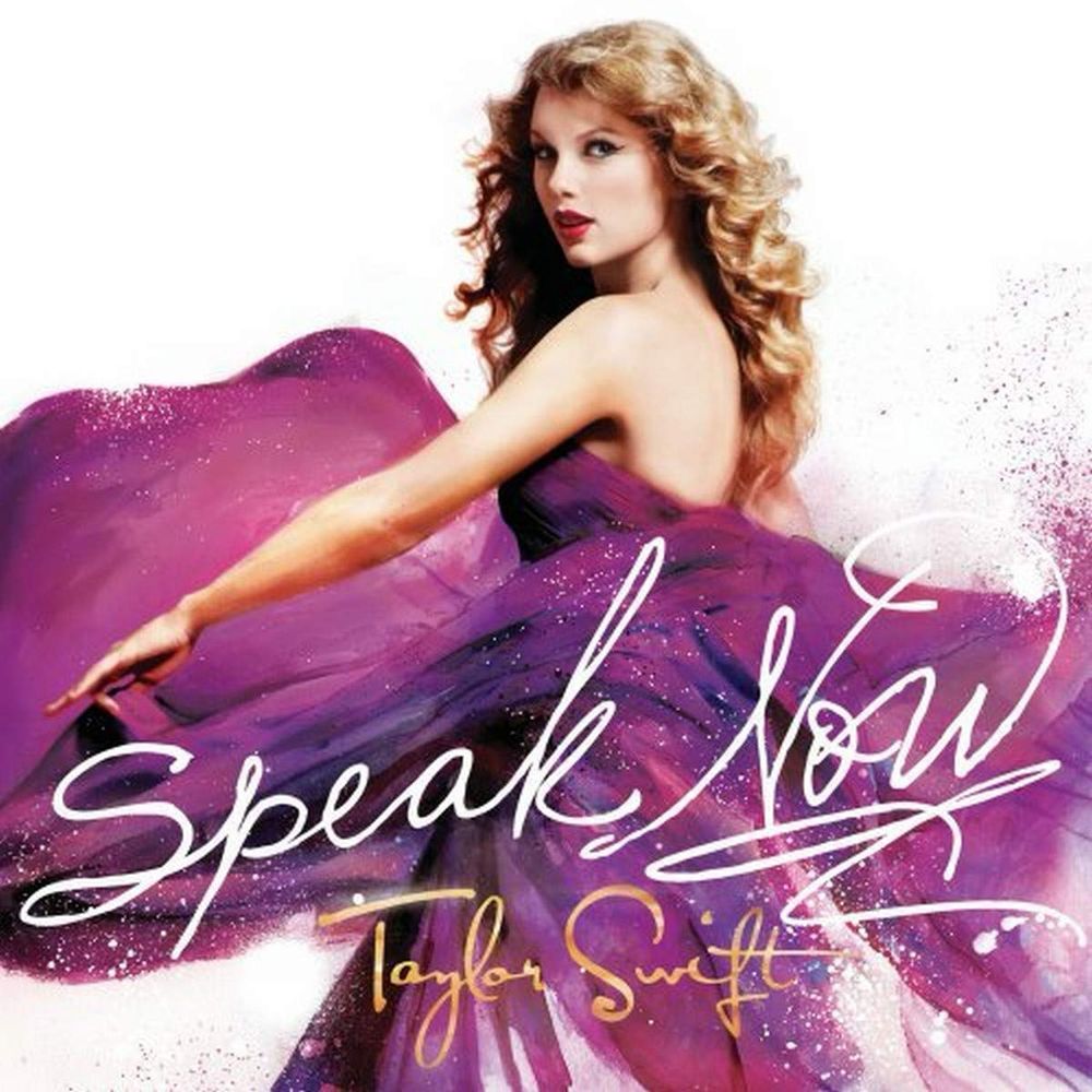 Album cover for Speak Now by Taylor Swift (original release). Taylor is in a swishy purple dress with the album title in a script font