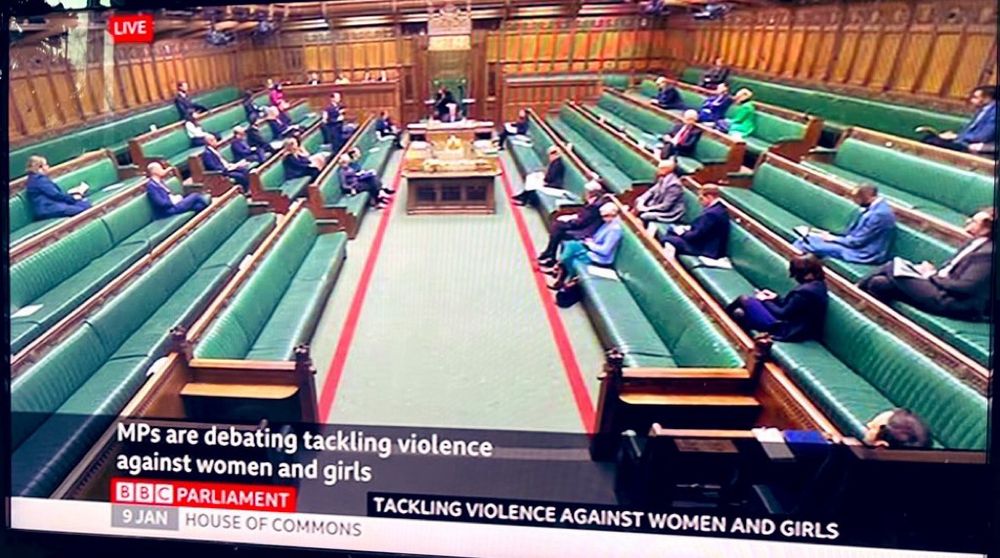 The House of Commons with a handful of MPs.