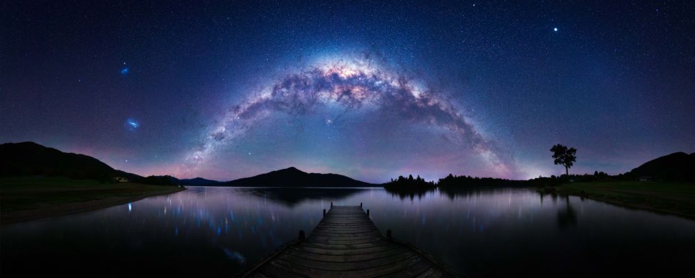 ✨The setting Milky Way. 
📍Lake Kaniere | West Coast | South Island | NZ

EXIF: Canon R6 | Tamron SP 35mm | Untracked  360 Panorama | 80 images | 8 seconds | f/2.8 ISO 10,000 

EDIT: Global adjustments in Lightroom 
Stitched with PTGui
Final edits with Photoshop 
