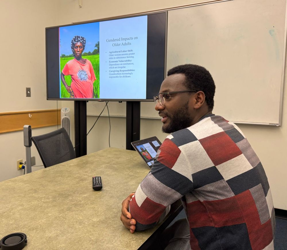 OU graduate student presenting a powerpoint 