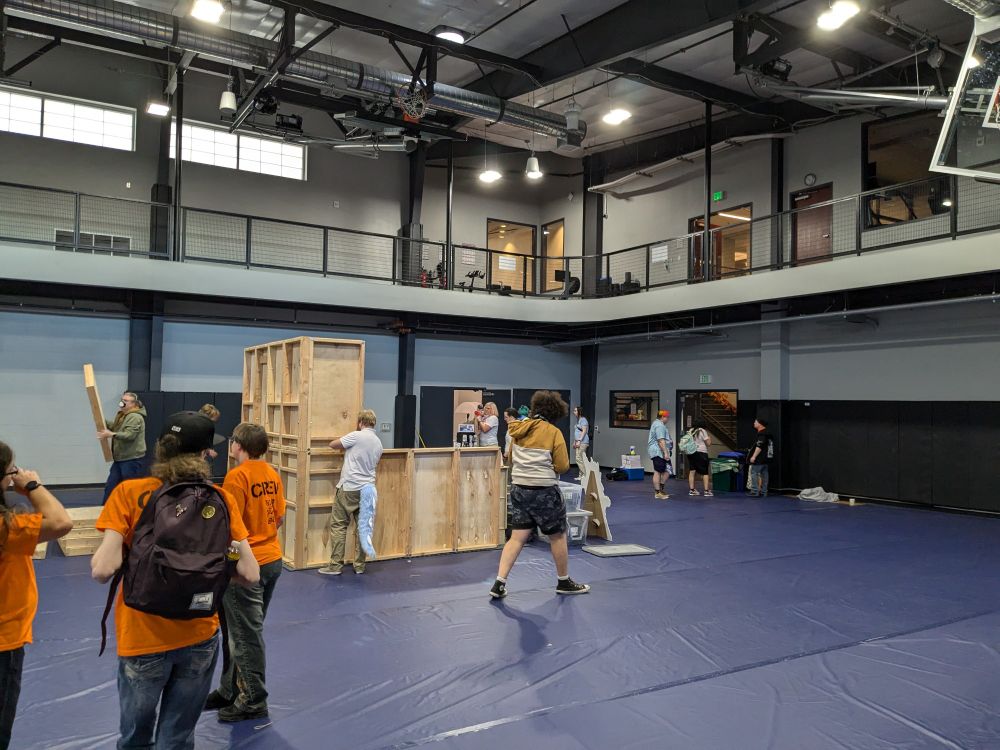 The gym that held were house art market is now mostly empty with dragon roast coffee's booth being disassembled while several volunteers clean the area