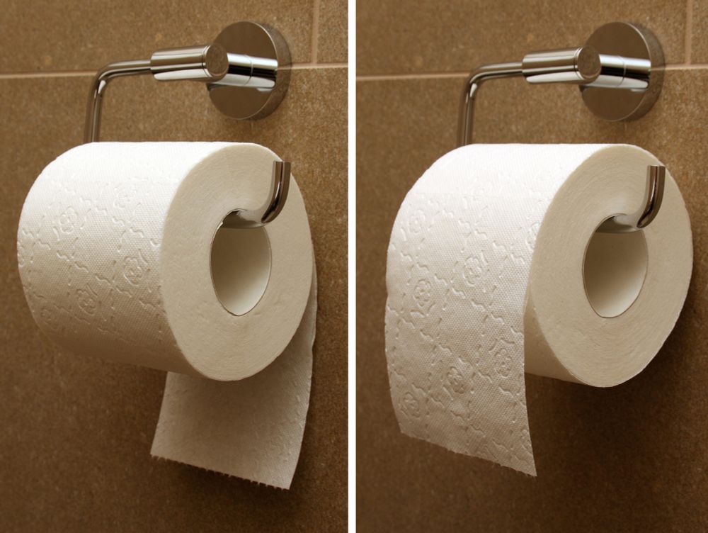 Showing a toilet paper roll went over one under