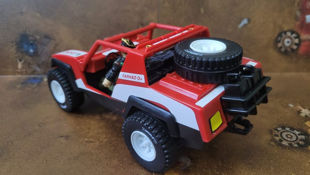 MRF Rally toy jeep with an old 3.75" G.I. Joe Flint toy driving.
