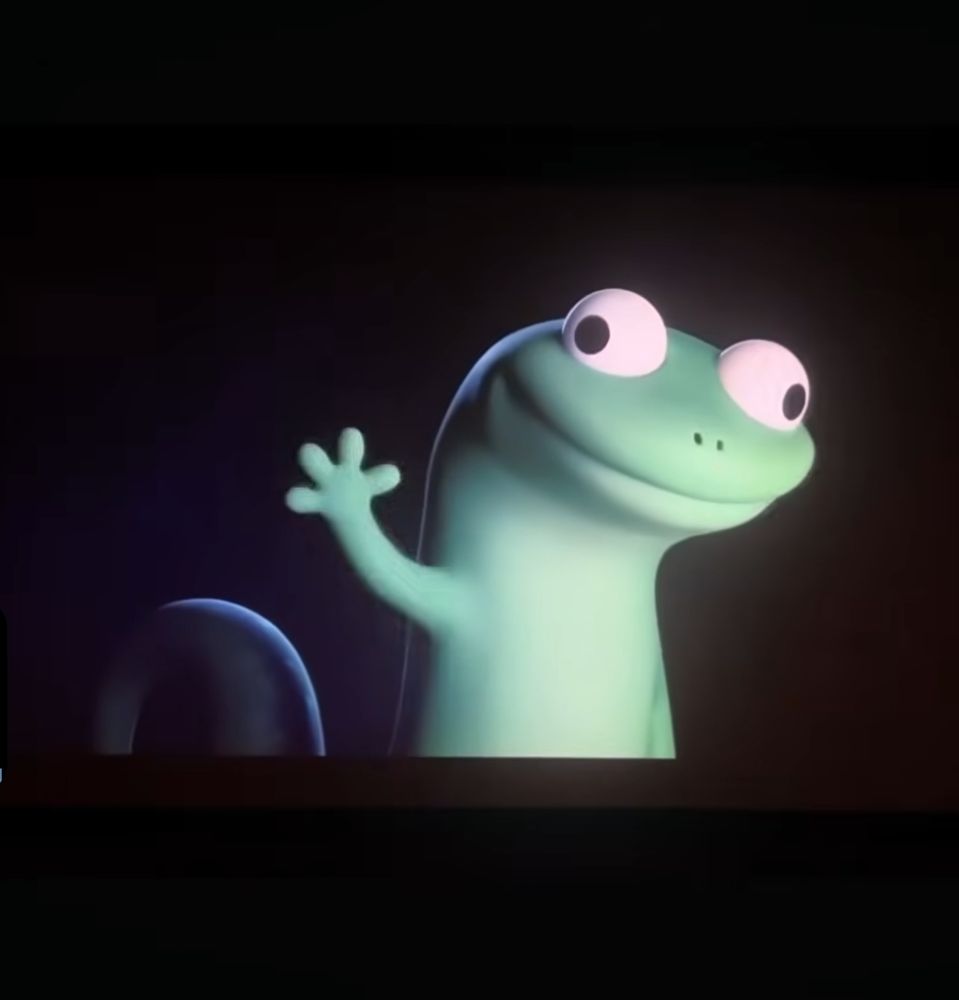 Lizard from the film Elio post credit scene holding paw/hand up having spammed a phone with the lizard emoji