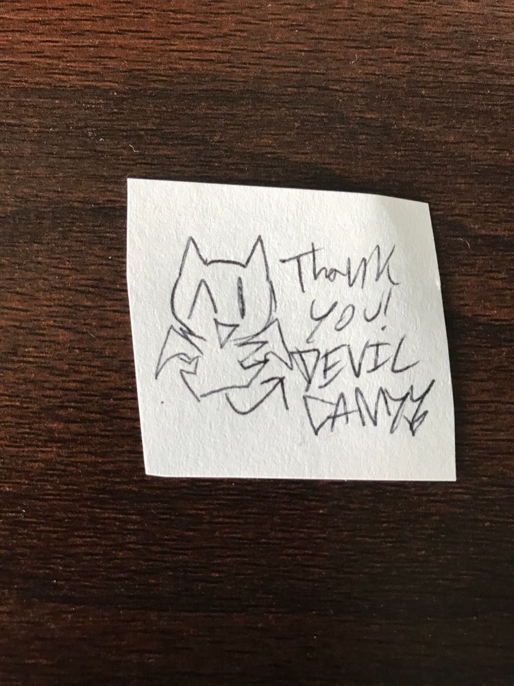 A sketch of a little winking devil next to “Thank you! DEVIL CANDY”