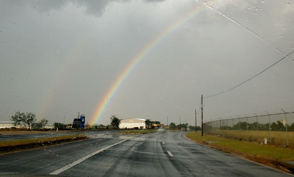 rainbow across a road