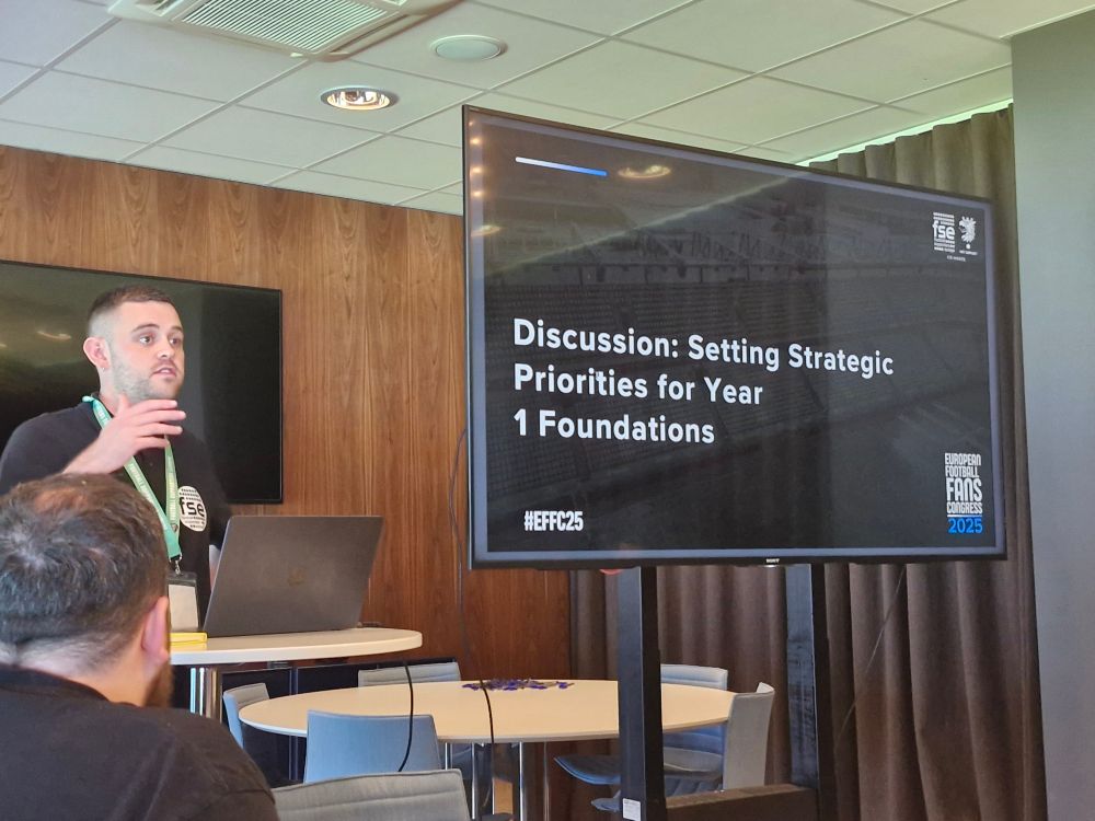 Image description: A screen with a slide showing a discussion about setting strategic priorities for year 1 foundations of the Diversity and Inclusion Network.