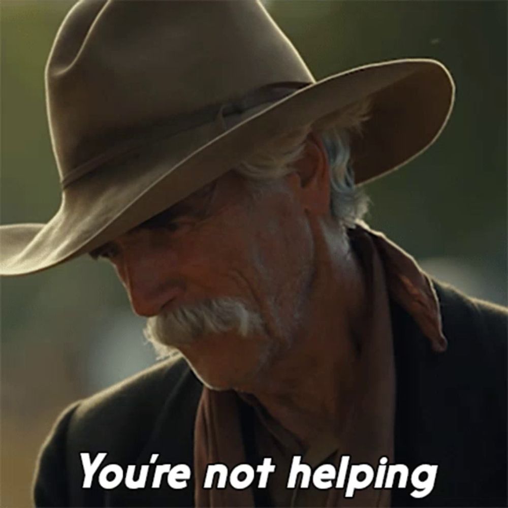 a man in a cowboy hat with a mustache says you 're not helping