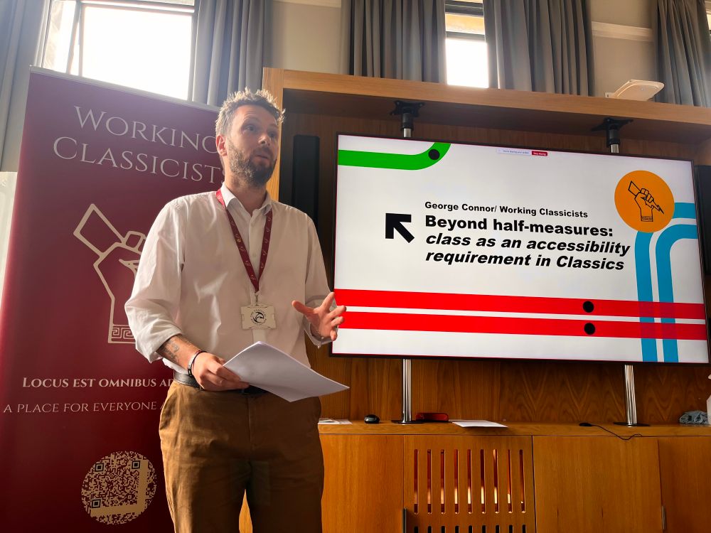 George Connor from Working Classicists giving a talk on class as an accessibility requirement in Classics at the Classical Association Conference in St Andrews