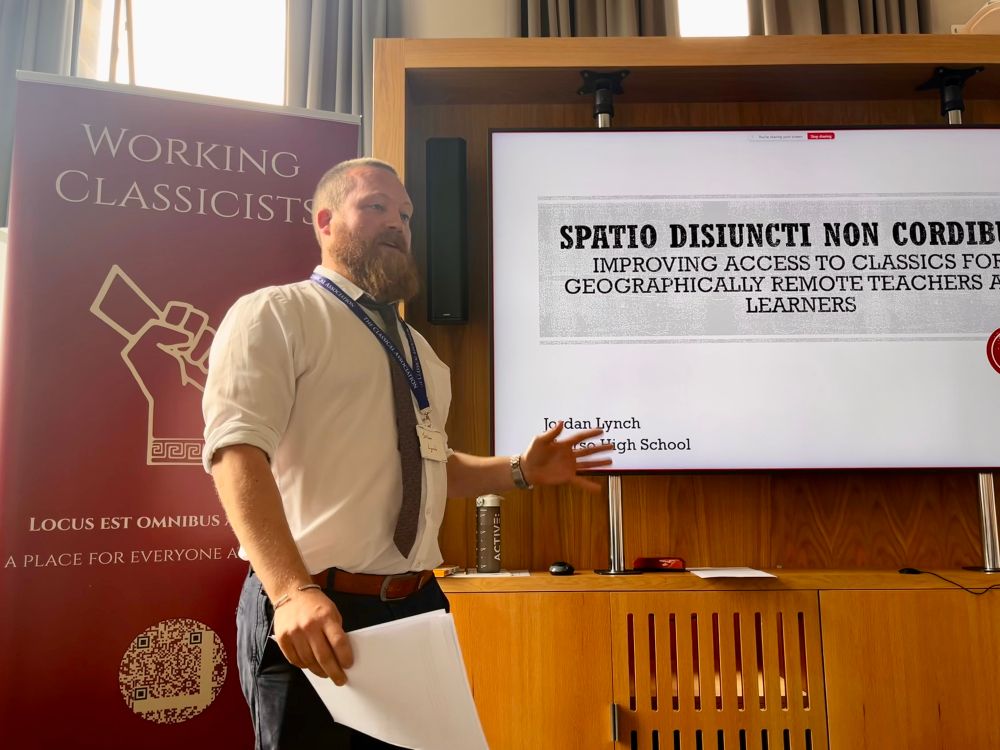 Jordan Lynch from Thurso High School giving a talk on improving access to classics for geographically remote teachers and learners at the Classical Association Conference 2025 on the Working Classicists panel. 