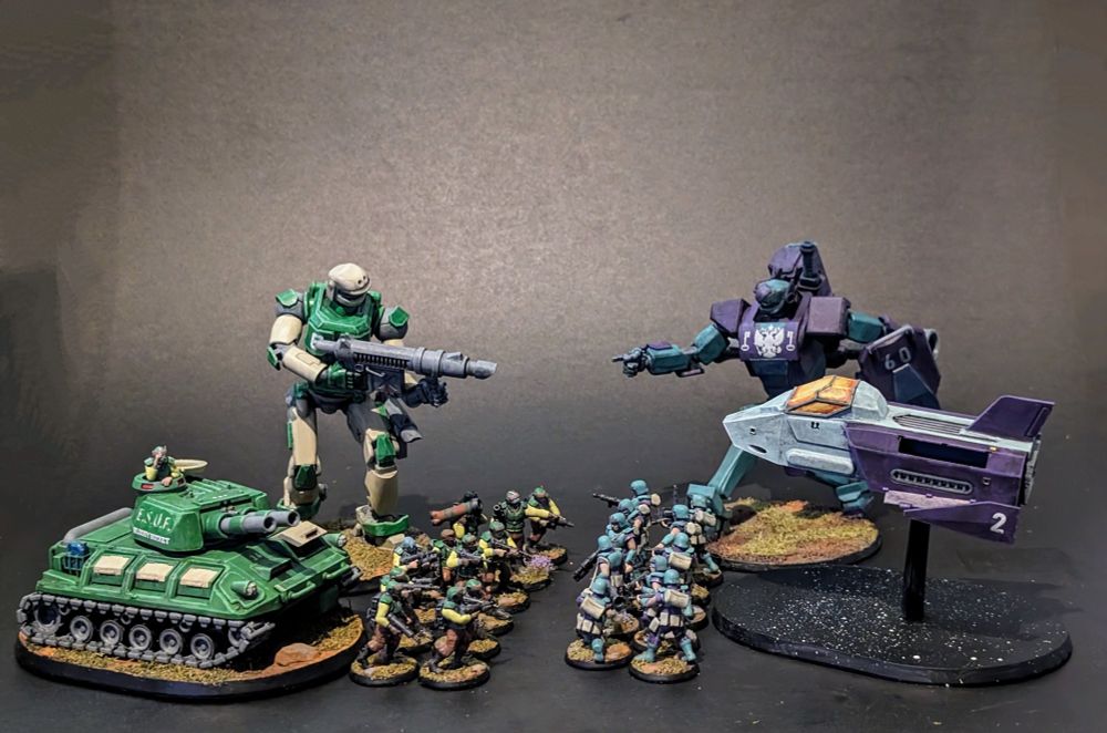And E.S.U.F. force and a Heliochrome force facing off

The E.S.U.F. force has an infantry squad, a mech with a beam rifle, and a tank.

The Heliochrome Force has a men at arms squad, a mech, and a air/space fighter craft.