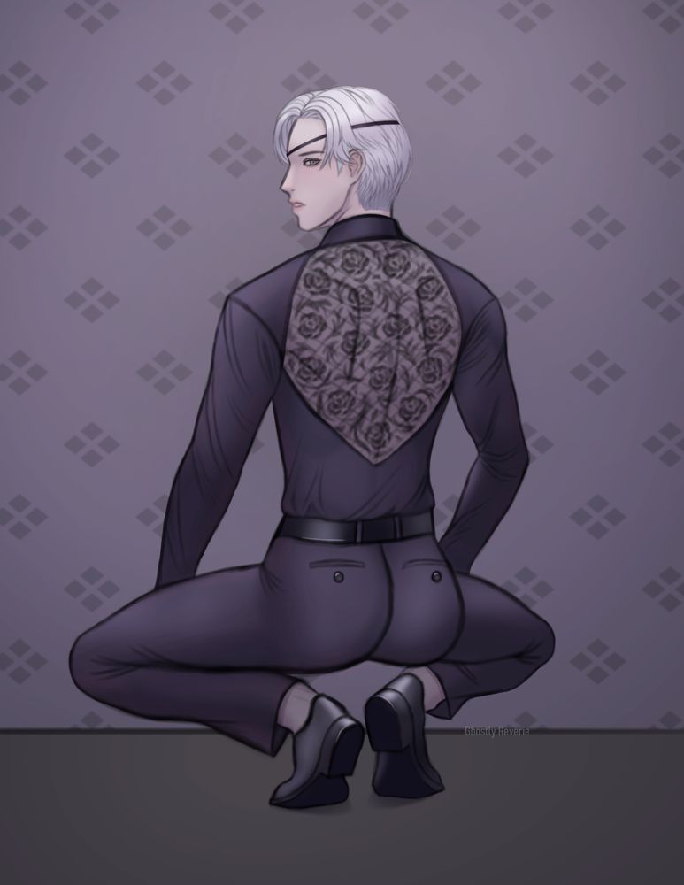 Back view of a man with white hair squatting on the floor. He is wearing an all-black outfit and eyepatch. There is a mesh with a rose pattern on the back of his shirt.