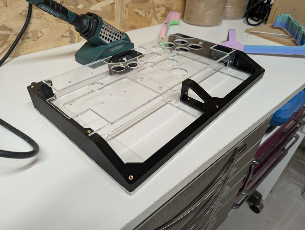 An arcade stick frame ready to be populated.
