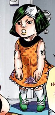 Manga screencap of Tsurugi standing in front of a door with his arms in front of him. He's just standing there and not really doing anything. His mouth is open and his expression is neutral