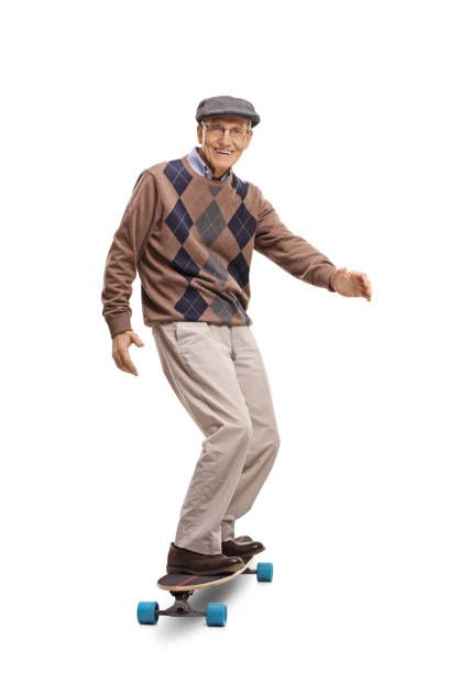 A stock photo of an old man on a skateboard.